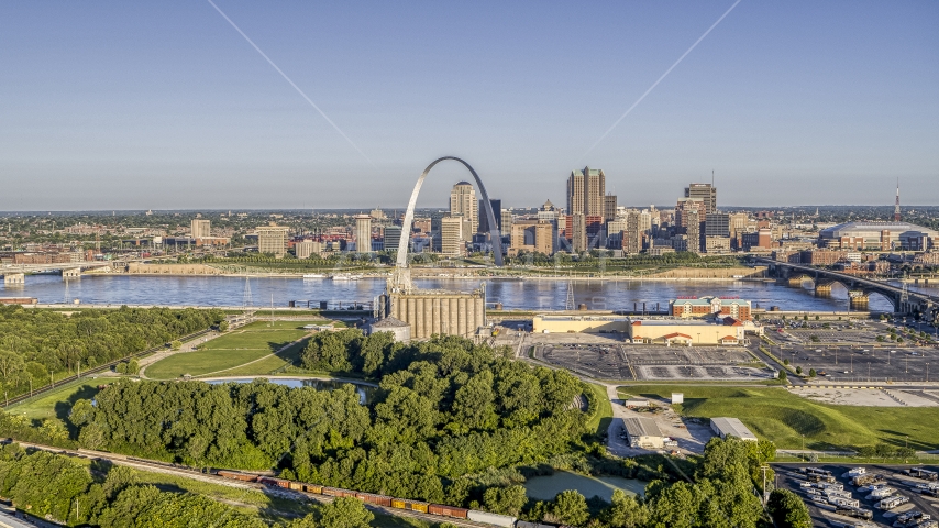 A park and grain elevator by the river with views of the Arch and skyline, Downtown St. Louis, Missouri Aerial Stock Photo DXP001_022_0002 | Axiom Images