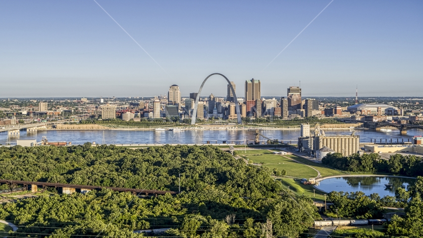 A riverfront park with view of the Arch and skyline, Downtown St. Louis, Missouri Aerial Stock Photo DXP001_022_0003 | Axiom Images