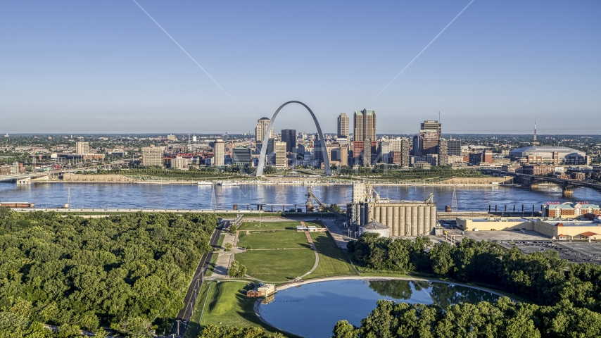 Riverfront park with Arch and skyline across the river, Downtown St. Louis, Missouri Aerial Stock Photo DXP001_022_0005 | Axiom Images
