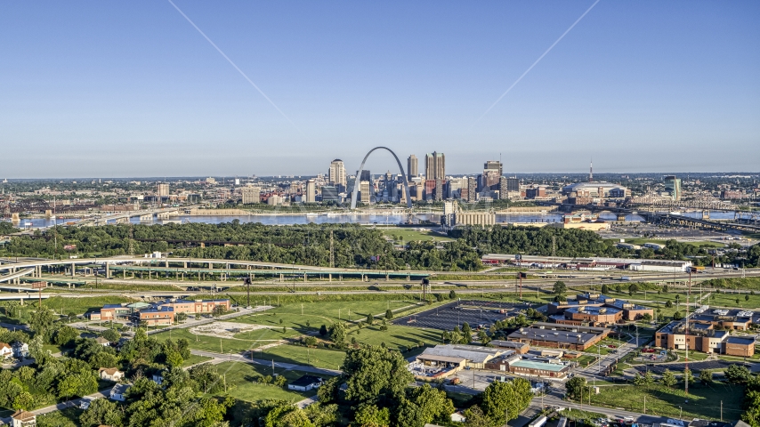 School and interstate in East St. Lous with view of skyline and Arch in Downtown St. Louis, Missouri Aerial Stock Photo DXP001_022_0006 | Axiom Images
