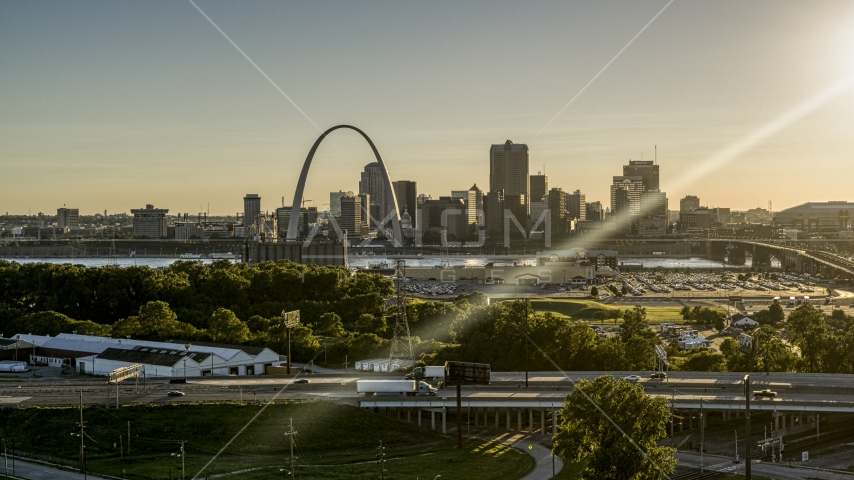 The Gateway Arch and Downtown St. Louis at sunset, seen from East St. Louis, Illinois Aerial Stock Photo DXP001_027_0004 | Axiom Images