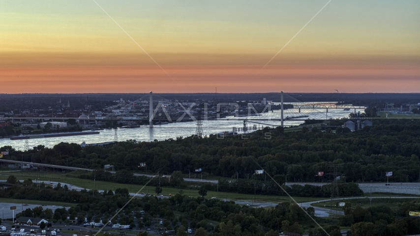 The Stan Musial Veterans Memorial Bridge and Mississippi River at sunset in St. Louis, Missouri Aerial Stock Photo DXP001_029_0009 | Axiom Images