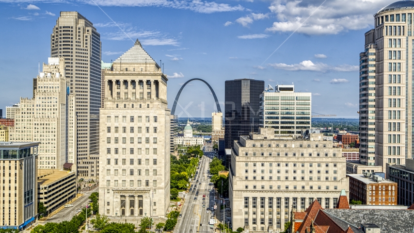 Courthouses and skyscrapers in Downtown St. Louis, Missouri, Gateway Arch in the background Aerial Stock Photo DXP001_031_0002 | Axiom Images