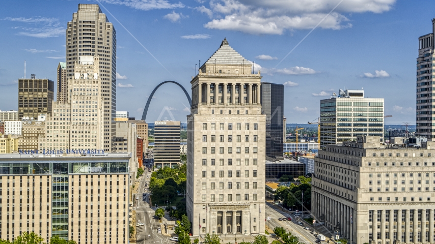 The Gateway Arch visible between the university and courthouse in Downtown St. Louis, Missouri Aerial Stock Photo DXP001_031_0004 | Axiom Images