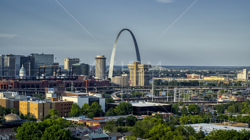 The Gateway Arch across the city in Downtown St. Louis, Missouri Aerial Stock Photo DXP001_033_0011 | Axiom Images