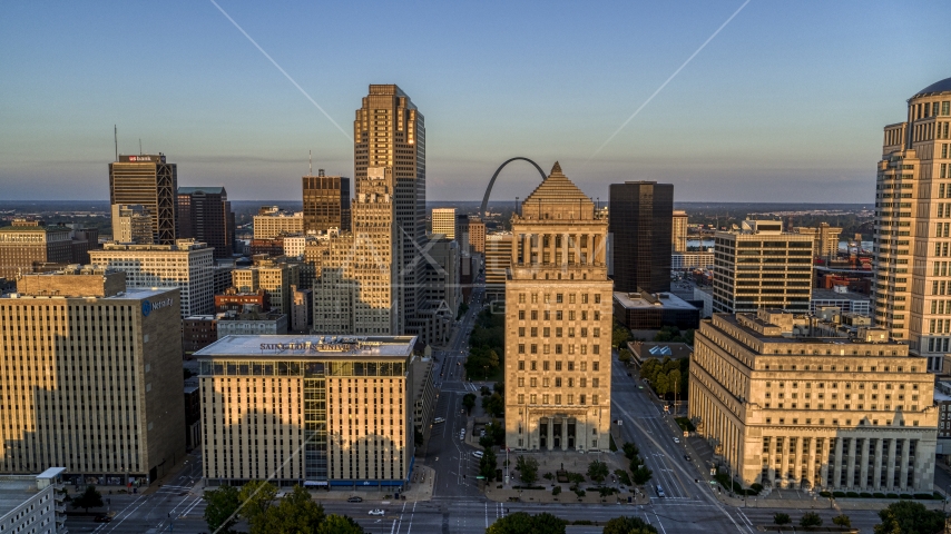 Gateway Arch behind courthouses at sunset, Downtown St. Louis, Missouri Aerial Stock Photo DXP001_035_0005 | Axiom Images