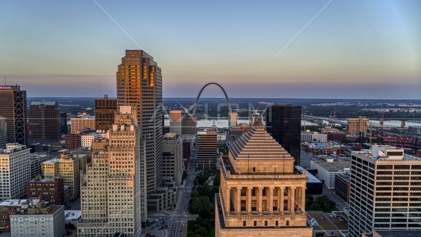 The Gateway Arch seen from the top of a downtown courthouse at sunset, Downtown St. Louis, Missouri Aerial Stock Photo DXP001_036_0003 | Axiom Images