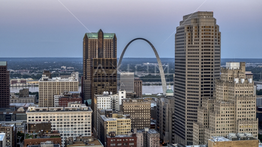 The Gateway Arch visible between two tall skyscrapers at twilight, Downtown St. Louis, Missouri Aerial Stock Photo DXP001_036_0010 | Axiom Images