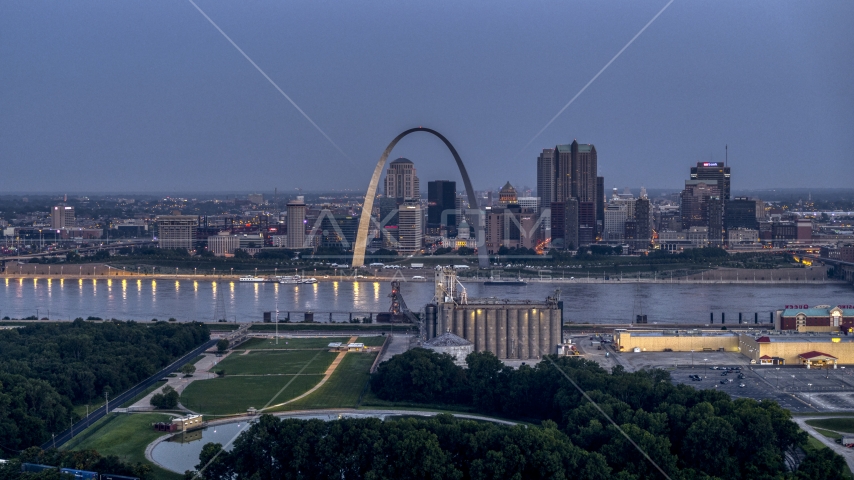The famous Gateway Arch at twilight, visible from across the Mississippi River, Downtown St. Louis, Missouri Aerial Stock Photo DXP001_037_0002 | Axiom Images