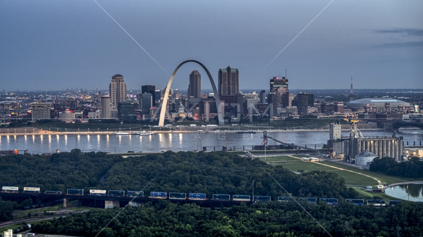 The famous Gateway Arch across the Mississippi River at twilight, Downtown St. Louis, Missouri Aerial Stock Photo DXP001_037_0011 | Axiom Images