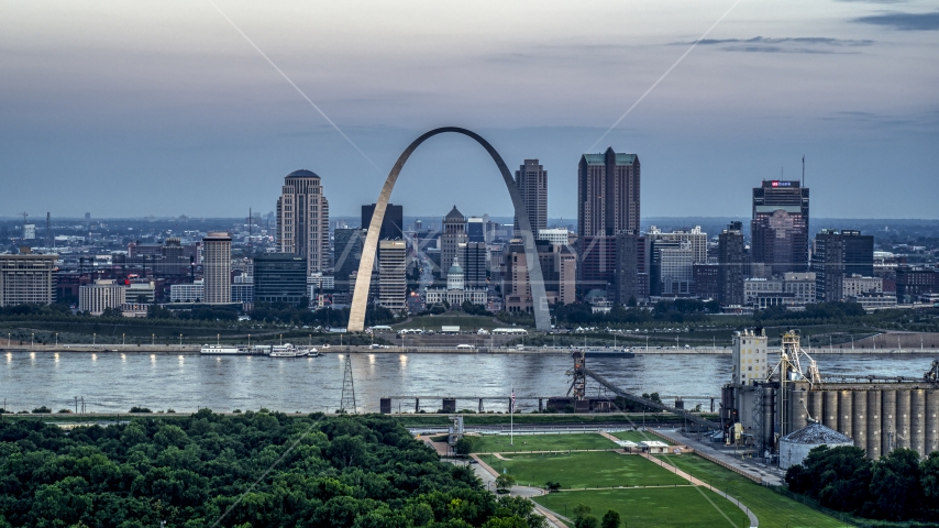 View of the Gateway Arch and the skyline of Downtown St. Louis, Missouri, at twilight Aerial Stock Photo DXP001_037_0016 | Axiom Images