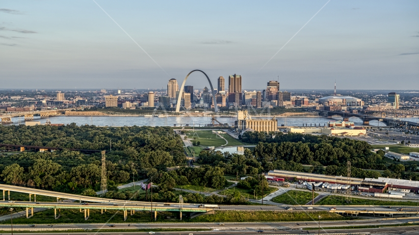 A wide view of the Gateway Arch in the morning, seen from I-55, Downtown St. Louis, Missouri Aerial Stock Photo DXP001_038_0008 | Axiom Images