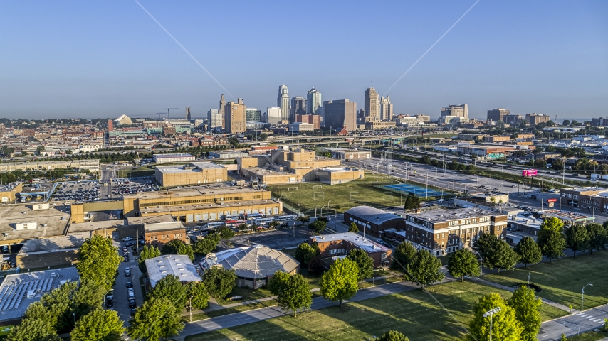 The downtown skyline in the distance at sunrise, Downtown Kansas City, Missouri Aerial Stock Photo DXP001_041_0002 | Axiom Images