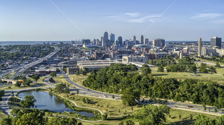 The city skyline seen from a small lake by Broadway Boulevard, Downtown Kansas City, Missouri Aerial Stock Photo DXP001_045_0004 | Axiom Images
