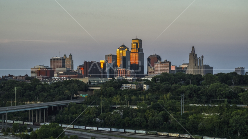 The tall skyscrapers of the city skyline at sunset in Downtown Kansas City, Missouri Aerial Stock Photo DXP001_046_0005 | Axiom Images