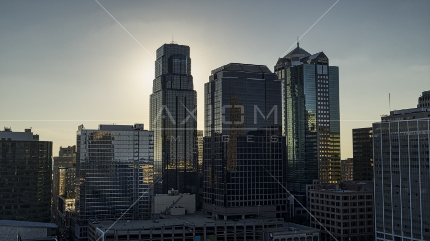 Towering city skyscrapers at sunset in Downtown Kansas City, Missouri Aerial Stock Photo DXP001_050_0006 | Axiom Images