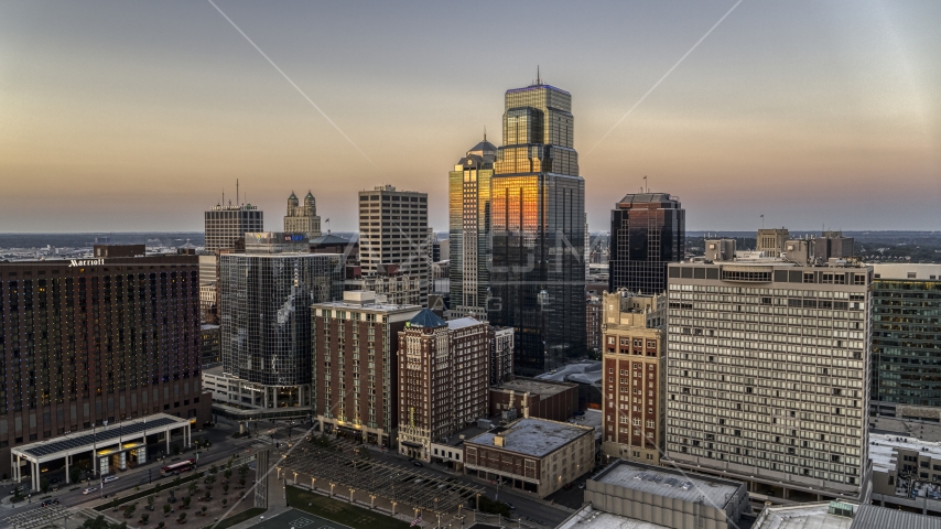 Skyscrapers and city buildings at twilight in Downtown Kansas City, Missouri Aerial Stock Photo DXP001_051_0015 | Axiom Images