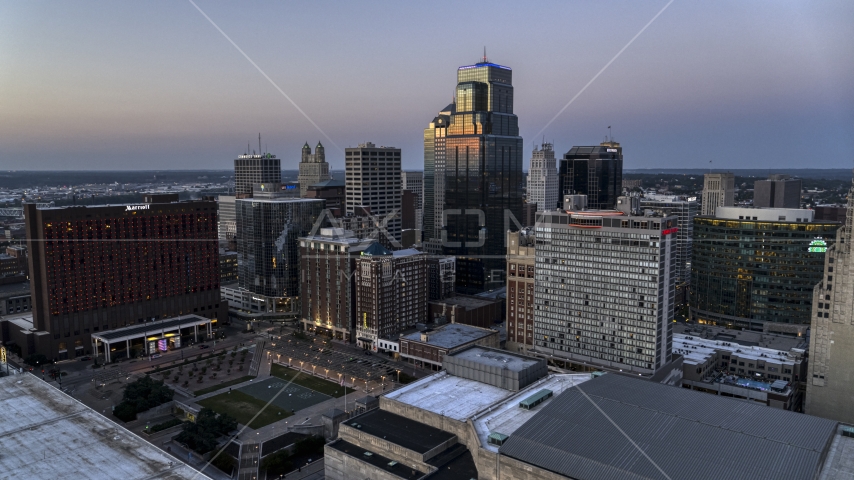 Skyscrapers and office buildings at twilight in Downtown Kansas City, Missouri Aerial Stock Photo DXP001_051_0019 | Axiom Images