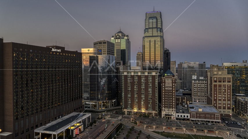 Marriott hotel and tall city skyscrapers at twilight in Downtown Kansas City, Missouri Aerial Stock Photo DXP001_051_0020 | Axiom Images