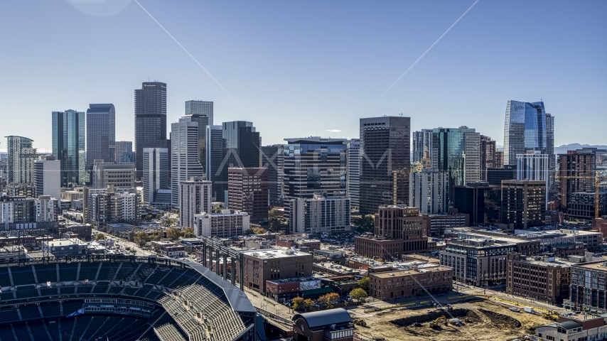 The city skyline seen from stadium in Downtown Denver, Colorado Aerial Stock Photo DXP001_054_0002 | Axiom Images