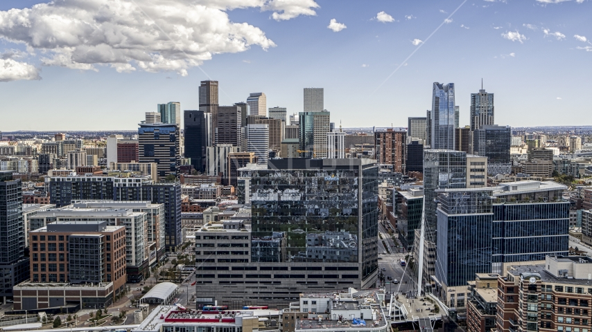 Office buildings and the city's skyline in Downtown Denver, Colorado Aerial Stock Photo DXP001_055_0002 | Axiom Images