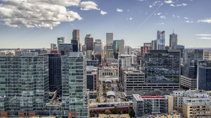 Office buildings with view of skyline in Downtown Denver, Colorado Aerial Stock Photo DXP001_055_0003 | Axiom Images