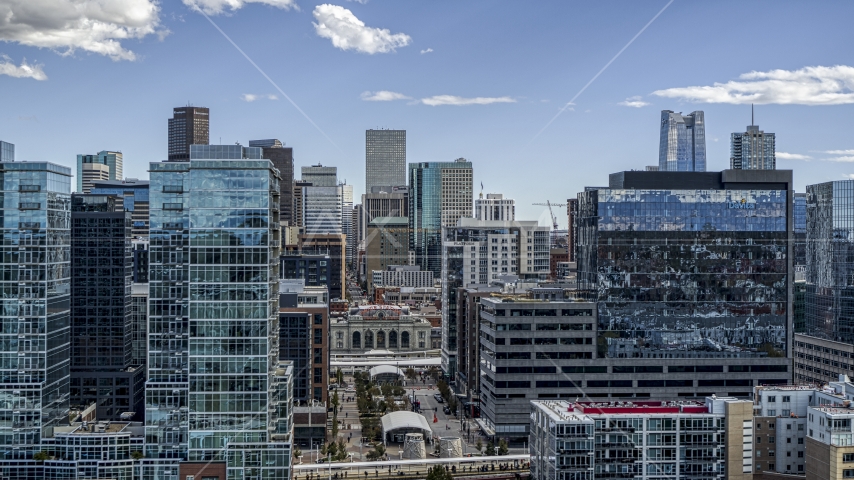 Office buildings with view of skyscrapers in Downtown Denver, Colorado Aerial Stock Photo DXP001_055_0008 | Axiom Images