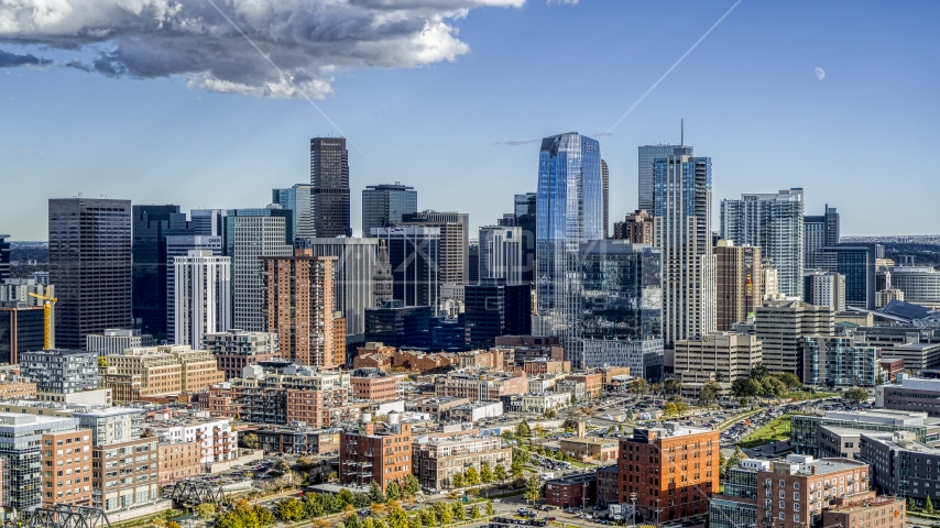 A view of towering skyscrapers of the city skyline in Downtown Denver, Colorado Aerial Stock Photo DXP001_055_0014 | Axiom Images