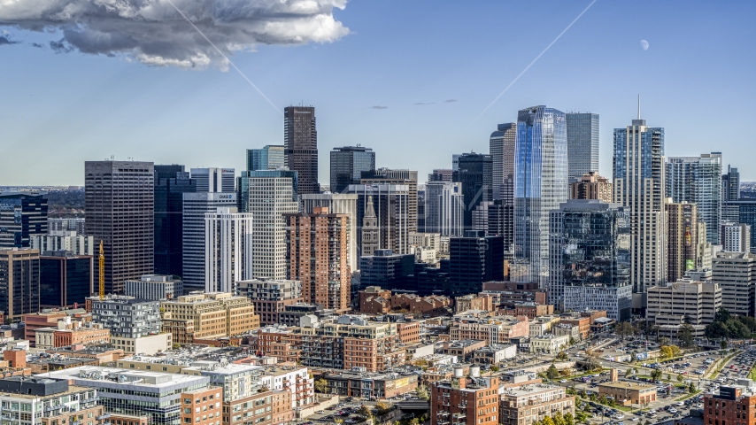 The towering skyscrapers of the city skyline in Downtown Denver, Colorado Aerial Stock Photo DXP001_055_0016 | Axiom Images