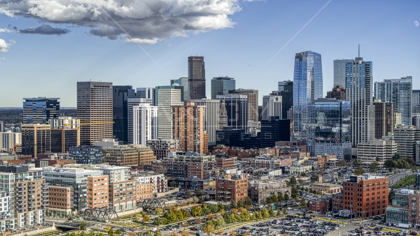 A view of the towering skyscrapers of the city's skyline in Downtown Denver, Colorado Aerial Stock Photo DXP001_055_0019 | Axiom Images