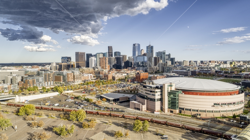 A view of arena, and the city skyline in the distance, Downtown Denver, Colorado Aerial Stock Photo DXP001_056_0004 | Axiom Images