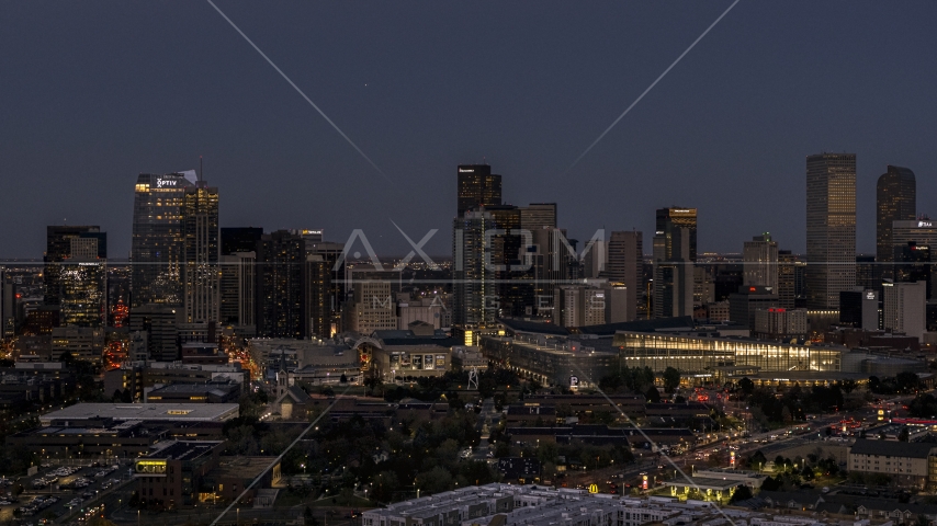 The city's towering skyscrapers and convention center at twilight, Downtown Denver, Colorado Aerial Stock Photo DXP001_057_0004 | Axiom Images