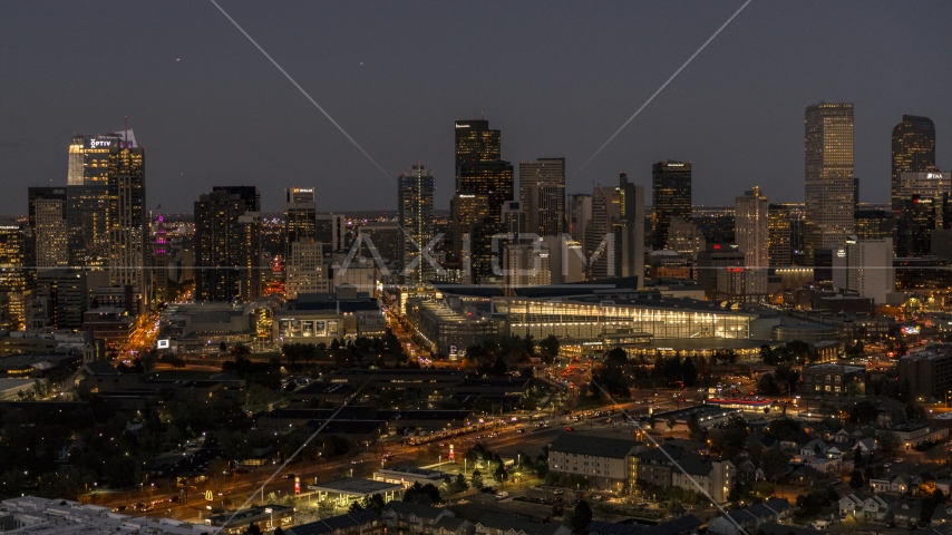 The city's skyline behind the convention center at twilight, Downtown Denver, Colorado Aerial Stock Photo DXP001_057_0007 | Axiom Images