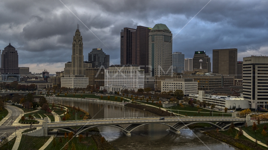 A view of the city skyline from a bridge spanning the Scioto River, Downtown Columbus, Ohio Aerial Stock Photo DXP001_087_0003 | Axiom Images
