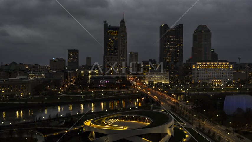 A view of the city skyline across the bridge and river at twilight, seen from the concert hall, Downtown Columbus, Ohio Aerial Stock Photo DXP001_088_0004 | Axiom Images