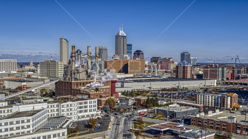 The city skyline and brick factory in Downtown Indianapolis, Indiana Aerial Stock Photo DXP001_089_0001 | Axiom Images