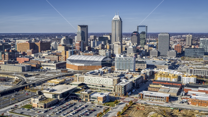 Arena and the city's skyline in Downtown Indianapolis, Indiana Aerial Stock Photo DXP001_090_0002 | Axiom Images