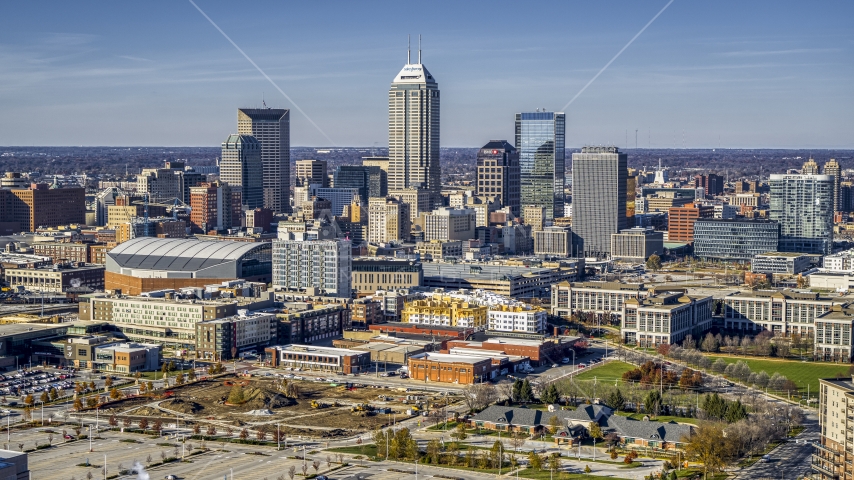 A wide view of tall skyscrapers in the city's skyline in Downtown Indianapolis, Indiana Aerial Stock Photo DXP001_090_0009 | Axiom Images