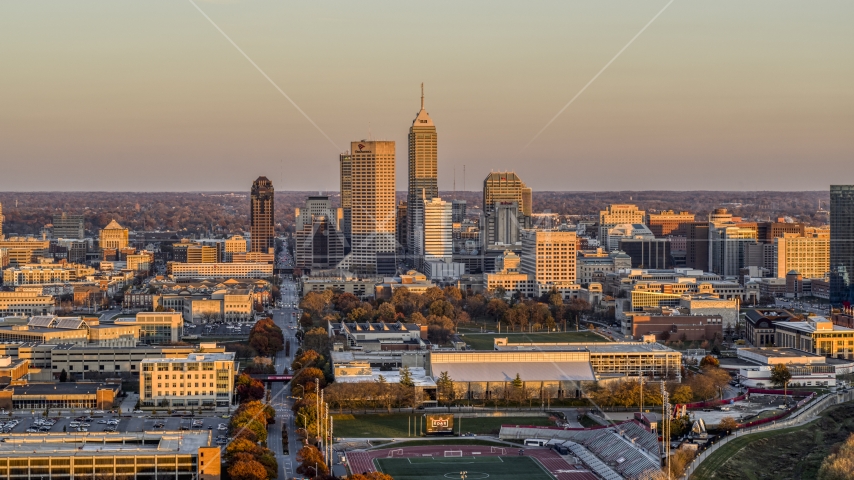 Wide view of the city's downtown skyline at sunset, Downtown Indianapolis, Indiana Aerial Stock Photo DXP001_092_0012 | Axiom Images