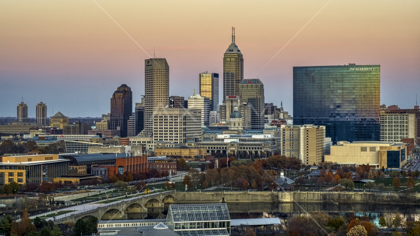 The city's skyline and a high-rise hotel at sunset, Downtown Indianapolis, Indiana Aerial Stock Photo DXP001_092_0018 | Axiom Images