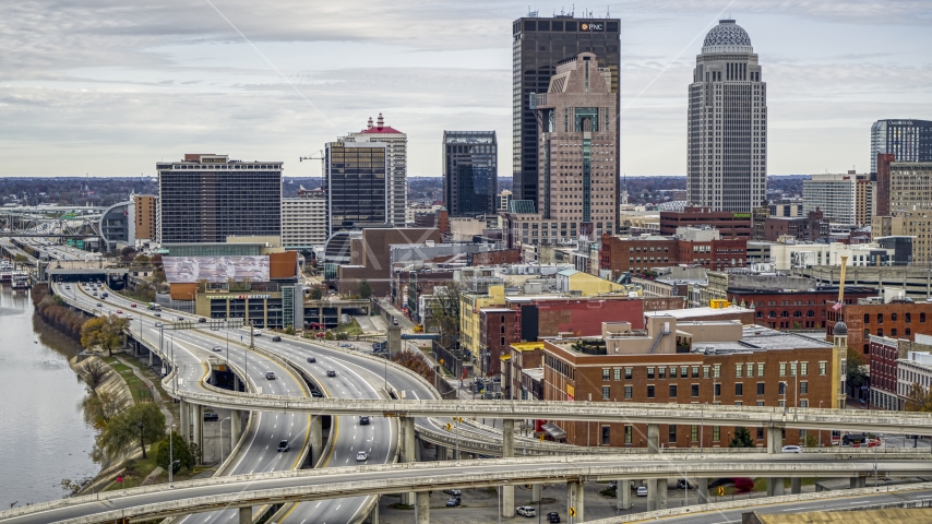 The city's skyline seen from an offramp in Downtown Louisville, Kentucky Aerial Stock Photo DXP001_095_0005 | Axiom Images