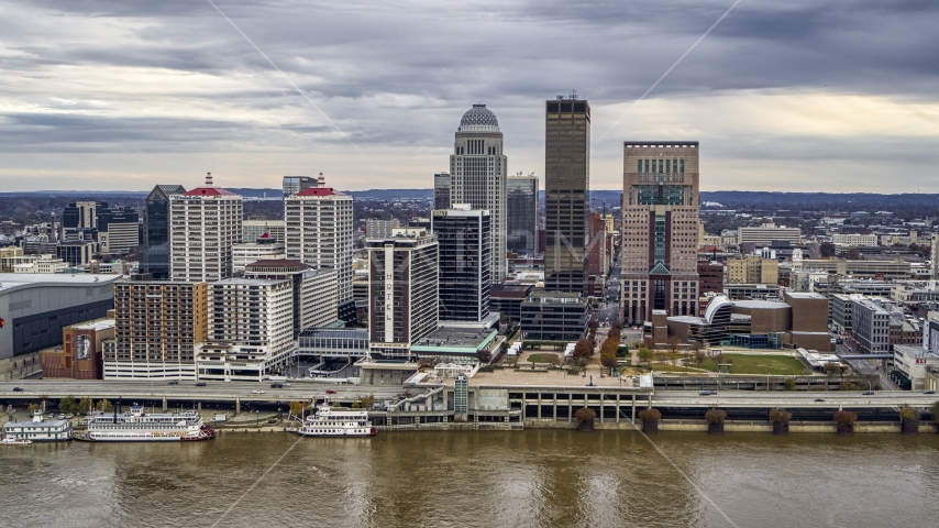 Hotel and the skyline from the Ohio River in Downtown Louisville, Kentucky Aerial Stock Photo DXP001_095_0012 | Axiom Images