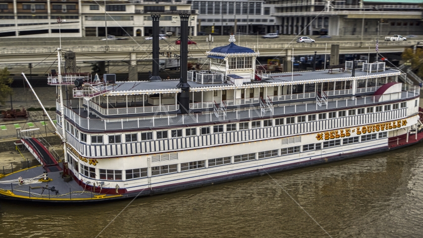 Close-up view of the historic riverboat docked by Downtown Louisville, Kentucky Aerial Stock Photo DXP001_095_0017 | Axiom Images