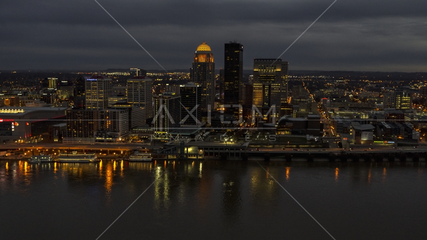 The city's skyline at twilight, seen from Ohio River, Downtown Louisville, Kentucky Aerial Stock Photo DXP001_096_0015 | Axiom Images