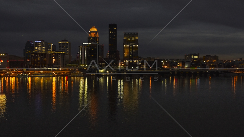 The city skyline at twilight across the river, Downtown Louisville, Kentucky Aerial Stock Photo DXP001_096_0017 | Axiom Images