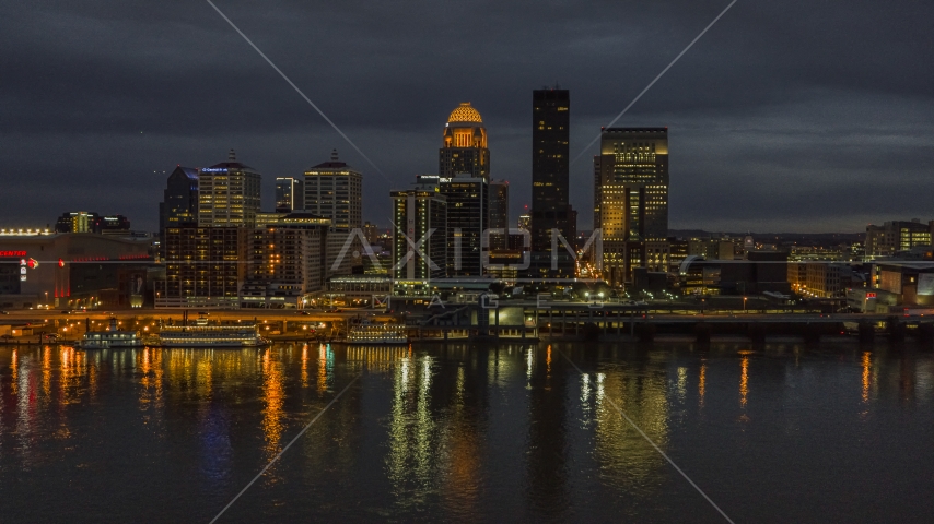 The Ohio River with a view of the city skyline at twilight, Downtown Louisville, Kentucky Aerial Stock Photo DXP001_096_0019 | Axiom Images