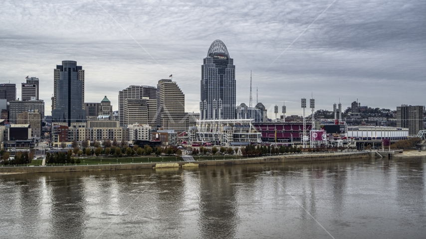 A view of the baseball stadium and skyscraper from the river, Downtown Cincinnati, Ohio Aerial Stock Photo DXP001_097_0001 | Axiom Images
