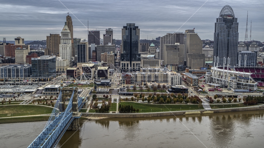 City skyline, seen from the Ohio River near bridge, Downtown Cincinnati, Ohio Aerial Stock Photo DXP001_097_0007 | Axiom Images