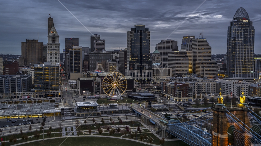 The city skyline and the Ferris wheel at sunset, Downtown Cincinnati, Ohio Aerial Stock Photo DXP001_097_0013 | Axiom Images