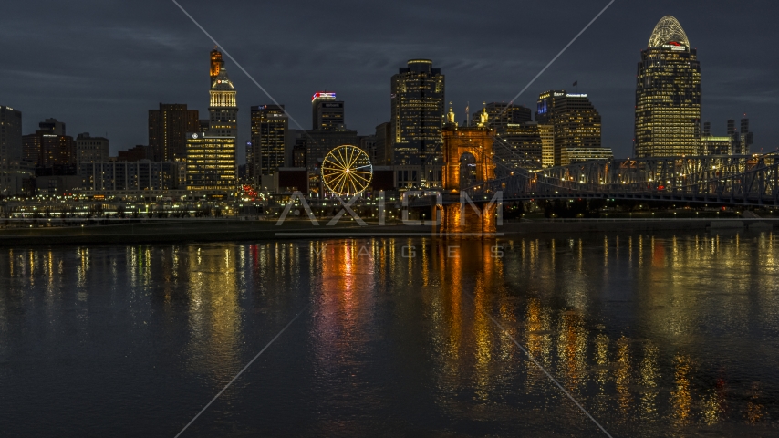 The city's skyline across the Ohio River at twilight, Downtown Cincinnati, Ohio Aerial Stock Photo DXP001_098_0015 | Axiom Images